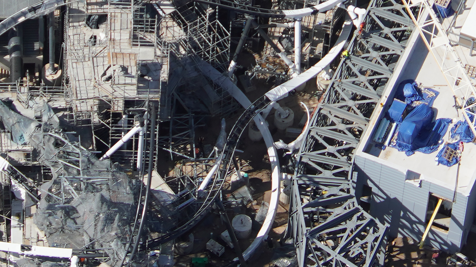 The Raptor Aerial Rope Park Aerial Photos Show Raptor Figures Positioned Near Track of Jurassic ...