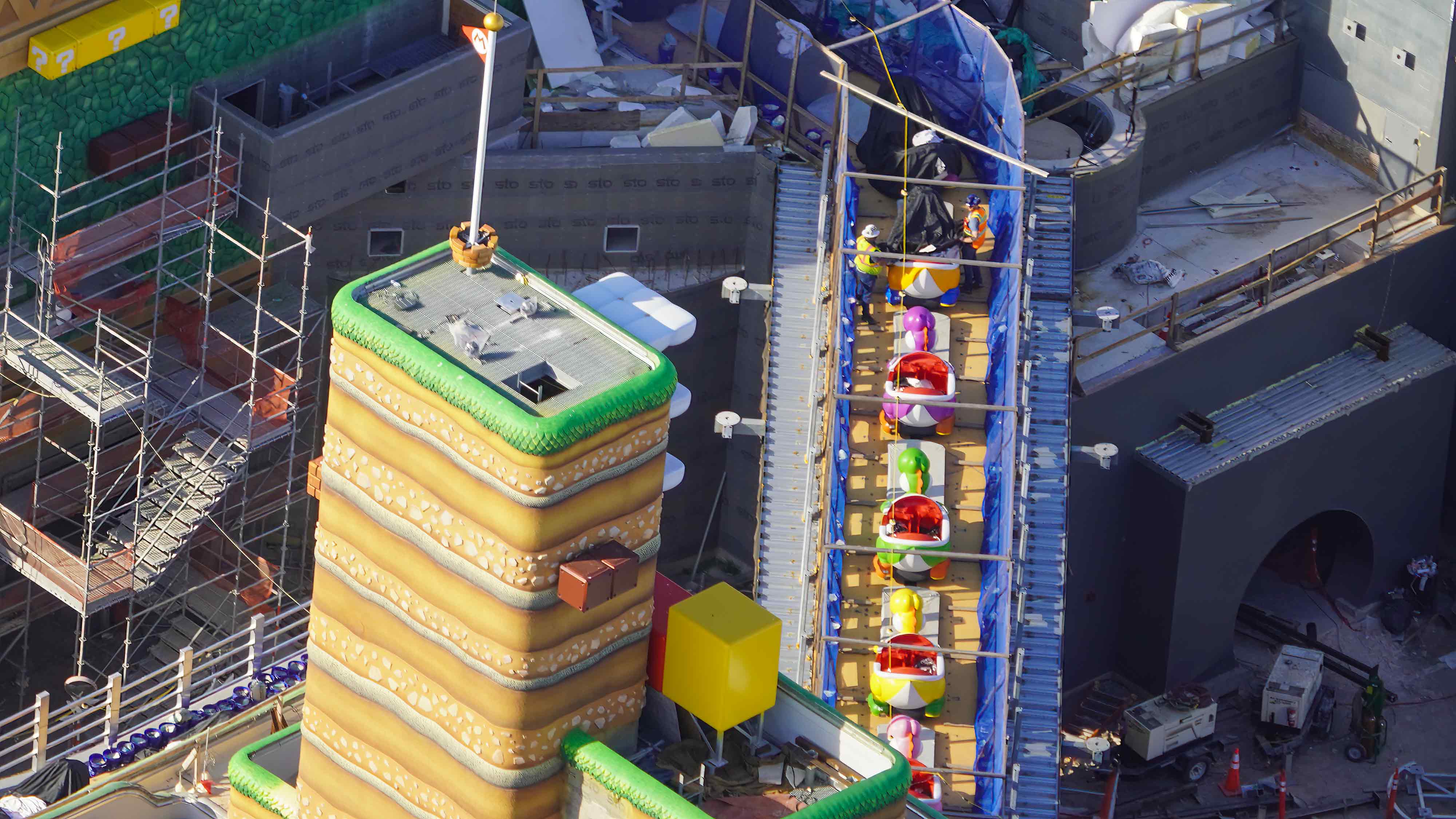 AERIAL PHOTO: Uncovered Yoshi's Adventure Ride Vehicles on Track in ...